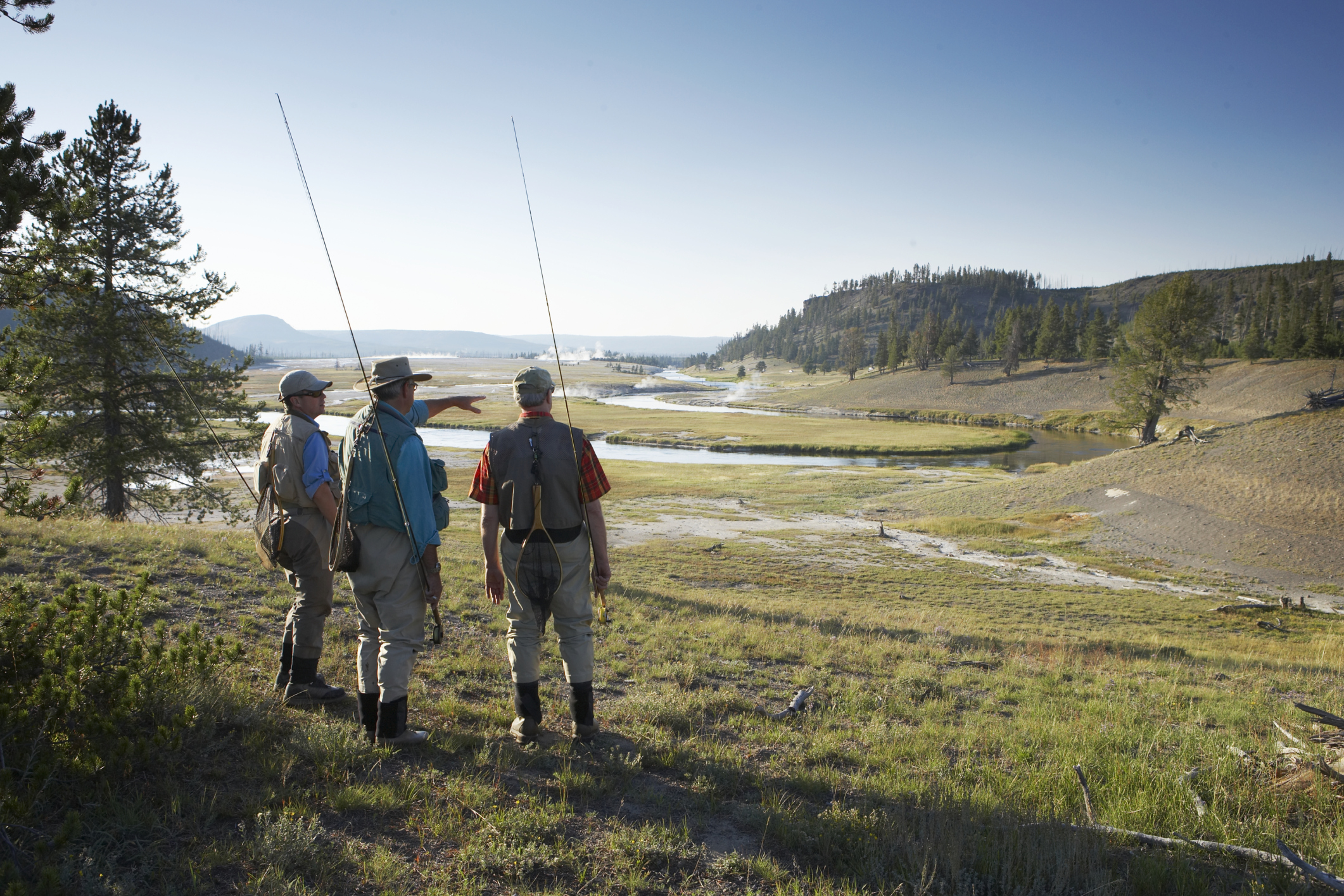 Fishermen overlooking valley